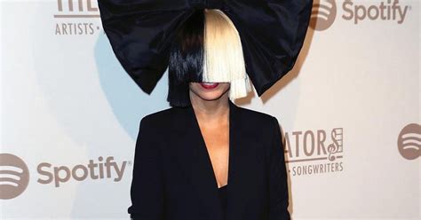 sia reveals her wig less face as she poses up a storm with katy perry