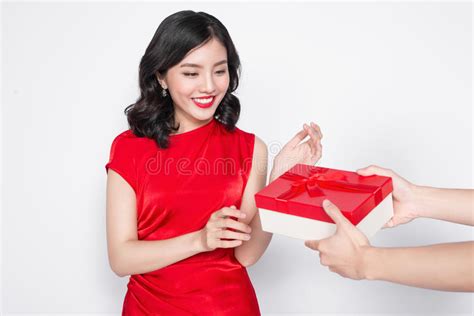 Beautiful Happy Asian Woman In Red Dress Receiving T