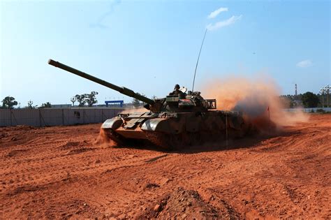 type  tank crosses muddy trench