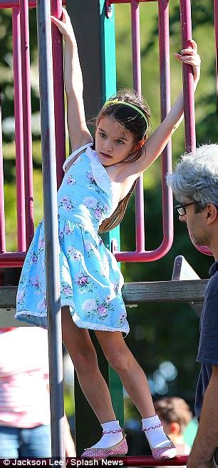katie holmes plays with suri as it emerges she s rekindled friendship