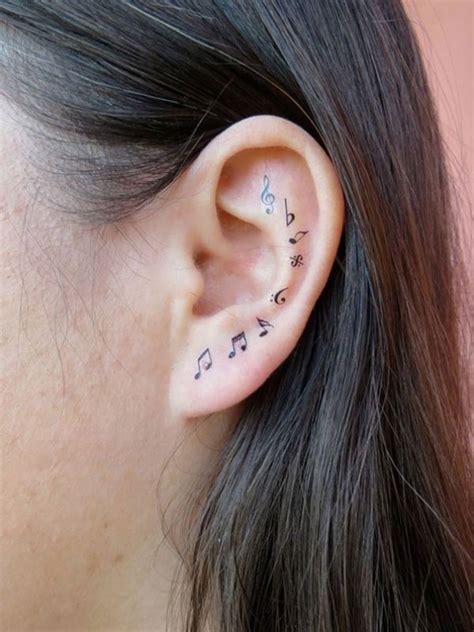 23 Tiny Ear Tattoos That Are Better Than Piercings