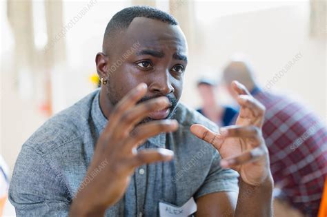 man talking gesturing  group therapy stock image