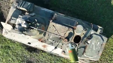 video shows ukraine drone drop  thermobaric grenade  russian tank fortyfive