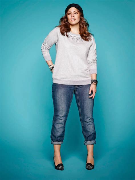 plus size model ashley graham wearing the sequin and pearl sweatshirt and suko jeans available
