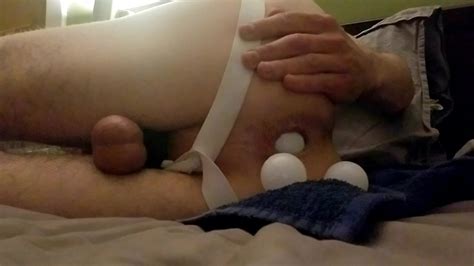 faggot pushes 5 ping pong balls out of its ass pussy