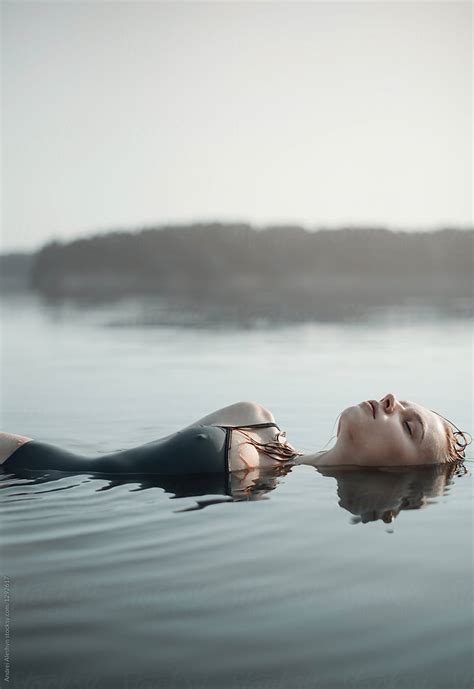 Beautiful Girl In The Morning In The Water By Stocksy Contributor