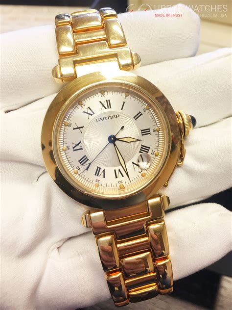 cartier pasha  yellow gold  upper watches