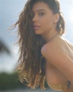 alexis ren gets a bucket of water poured on her swimsuit