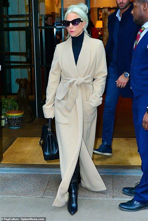 lady gaga exudes classic glamour as she checks out of her