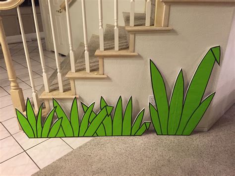 magalie sarnataros props jungle vignette grass cutouts glued wrapping