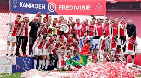 ajax claim record extending eredivisie title  thumping win  emmen football news