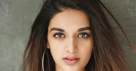 nidhhi agerwal glamourous pose in lingerie indian girls villa