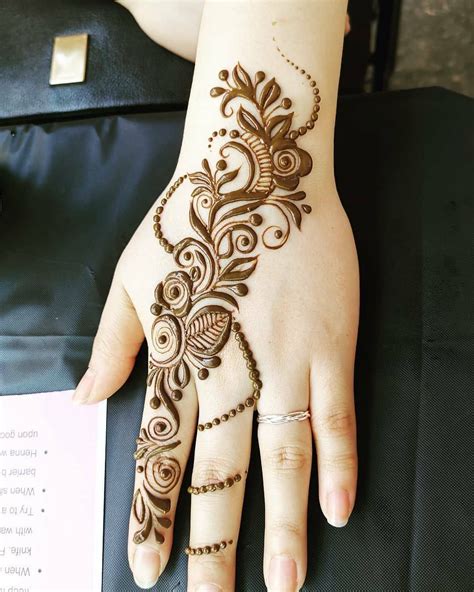 simple arabic henna designs  left hand