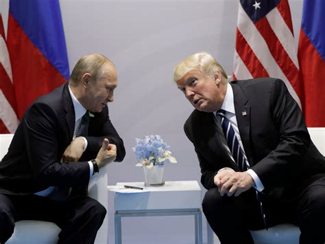 photos trump meets putin says honor to be with him