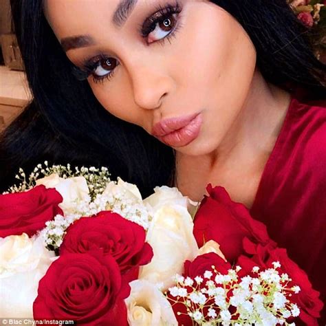 blac chyna dresses up in sexy crimson dress on instagram