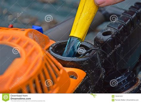 fueling  chainsaw stock image image  danger industry