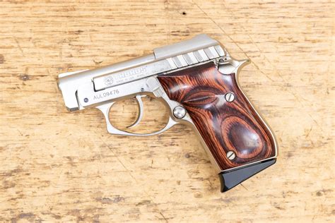 taurus pt  lr stainless police trade  pistol  rosewood grips