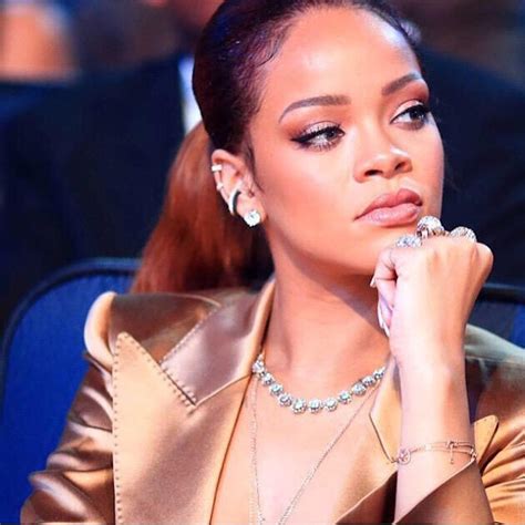rihanna rocked a gold suit at the bet awards because she s a boss like