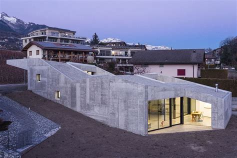 concrete home climbs  small sloping site  switzerland curbed
