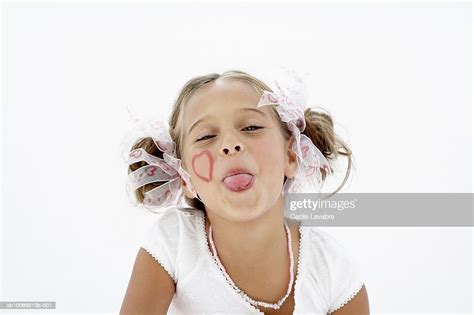 Girl Sticking Out Tongue Closeup Portrait Photo Getty Images