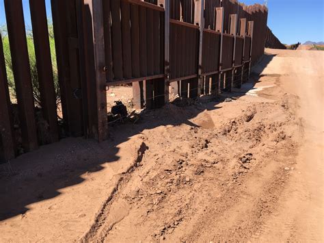 trumps border wall vulnerable  flash floods  large storm gates left open  months