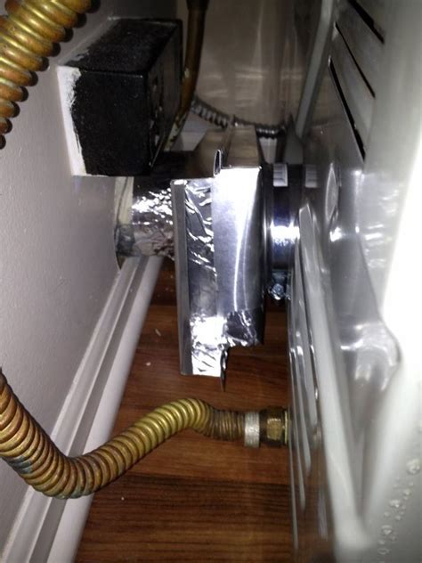 hook   dryer vent   tight space