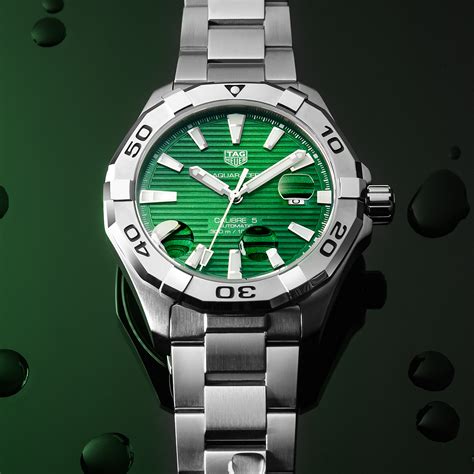 emerald depths tag heuers  green dialed aquaracers watchtime usas