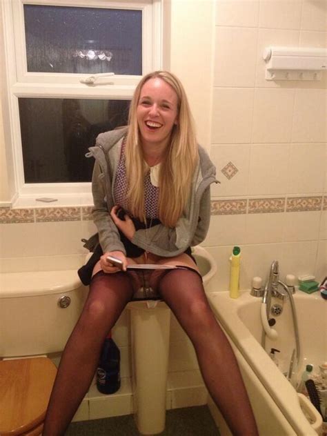 embarrassed girl caught being naughty in the bathroom