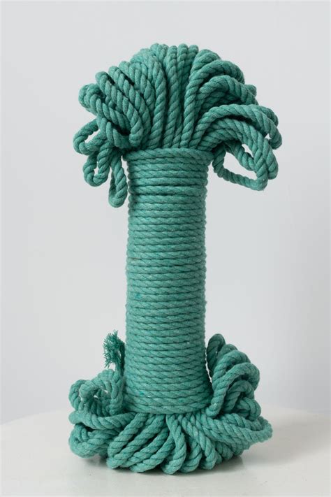 rope wrapped  green color  white background