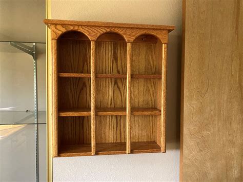 lot  oak curio display shelf attached  wall      puget sound estate sales