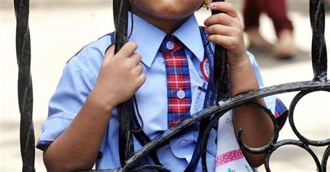 class 2 girls asked to unbutton shirts as punishment for not doing