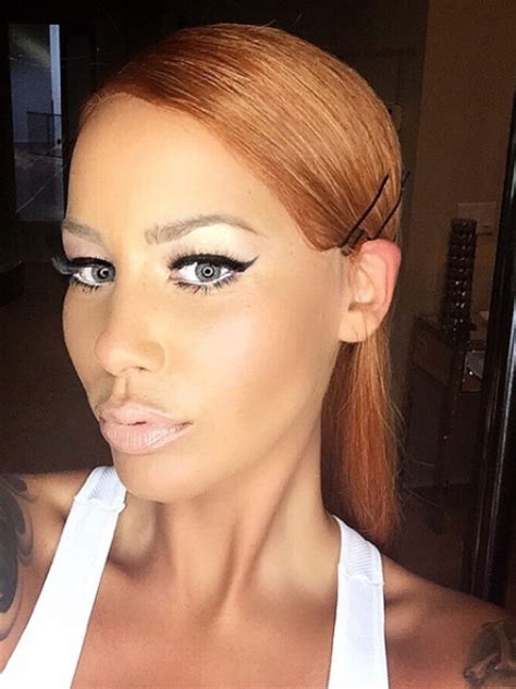 Now That Is A New Look Amber Rose Shows Off Her New Long Hair On