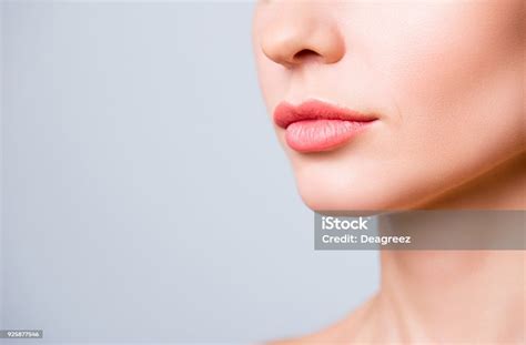 Cropped Close Up Photo Of Beautiful Womans Lips With Shape Correction