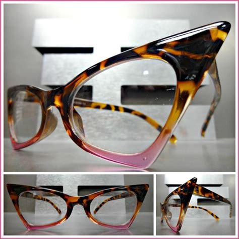 exaggerated retro cat eye style eye glasses pointy tortoise and pink