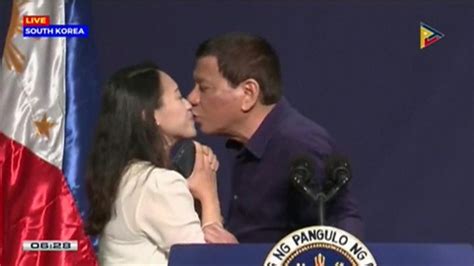philippine president duterte condemned for kissing overseas worker