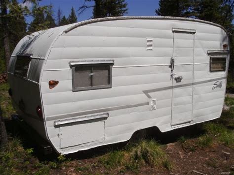 vintage  shasta camper  long  dual propane mounted   front  camper