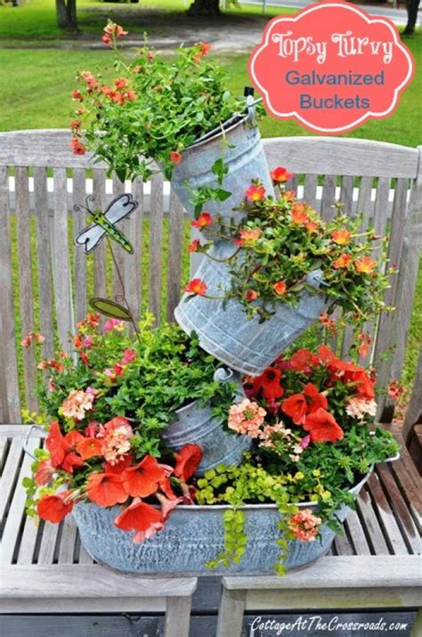 create your own topsy turvy planter with galvanized buckets home and