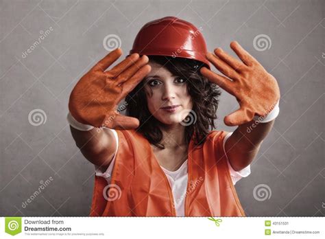 girl in safety helmet showing stop sign stock image image of work roadwork 43151531