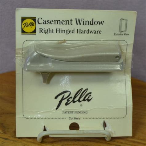 pella casement window  hinged hardware cover lock handle  champagne pella