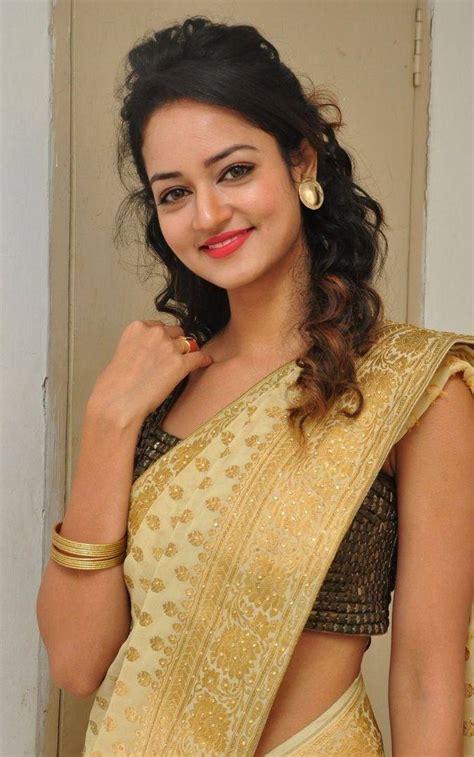 indian actress shanvi srivastava hip navel photos in yellow saree tollywood stars