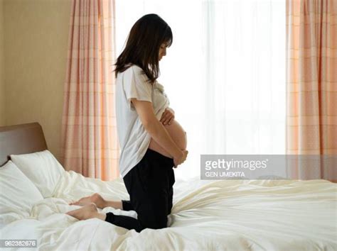 world s best asian women giving birth stock pictures photos and