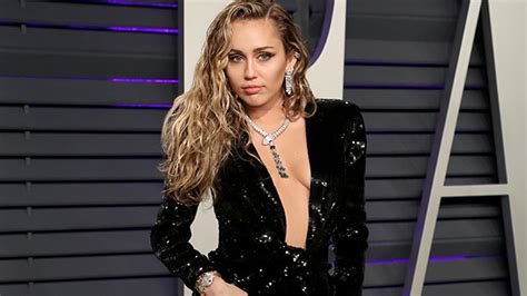 miley cyrus at oscars after party 2019 — see her black low cut dress hollywoodlife