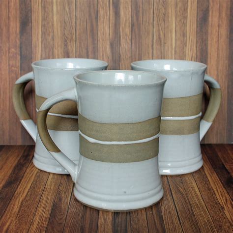 vintage stoneware pottery mug set   white  tan modern striped banded design ceramic coffee