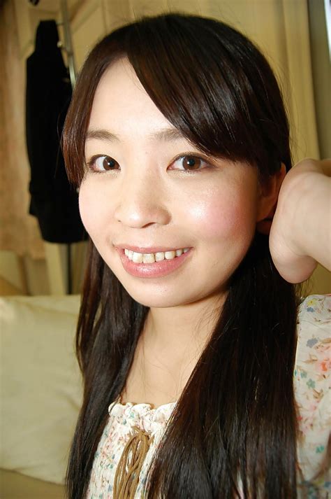 smiley asian teen in stockings undressing and spreading her hairy pussy lips