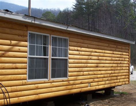 faux log cabin siding   mobile home thinking     houses siding