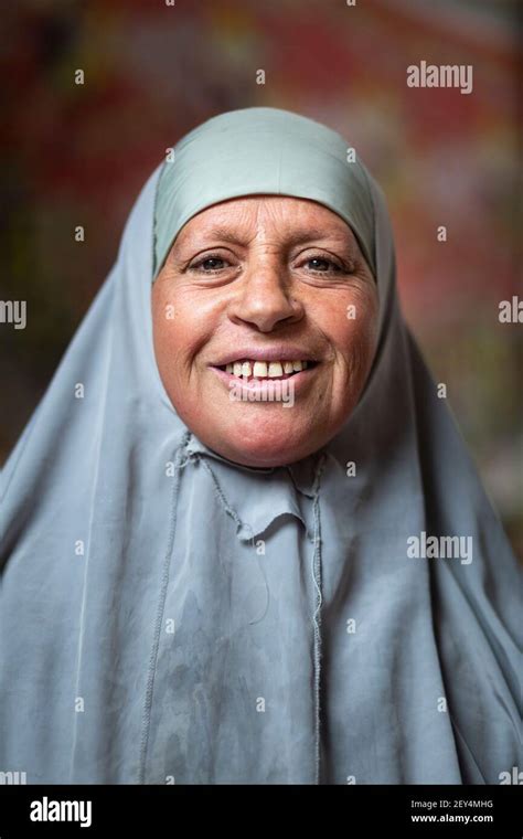 Portrait Of A Smiling Local Egyptian Woman Wearing A Hijab In Downtown