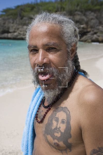 curacao tattoo piercing man    tif