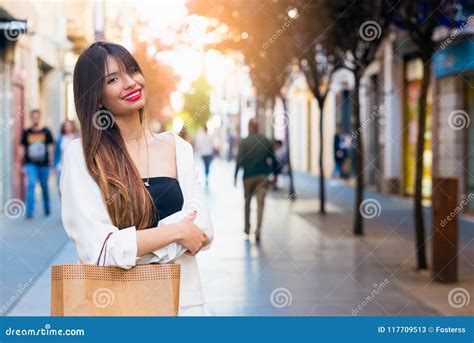 beautiful young woman buying stock image image  dress adult