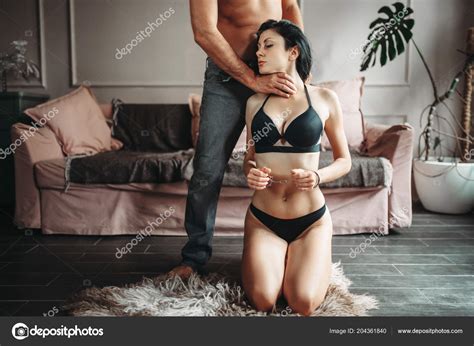 man holding throat woman handcuffs girl underwear erotica