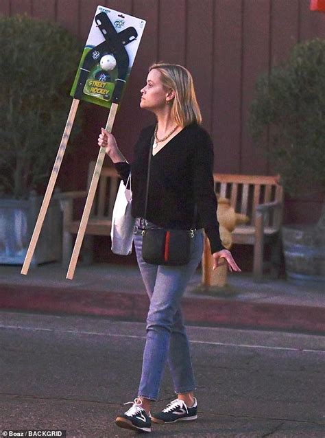 Reese Witherspoon Keeps It Casual On An Evening Run To The